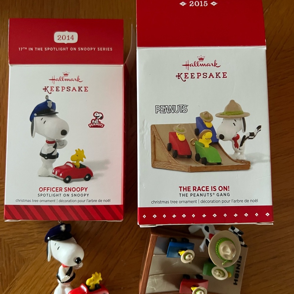Snoopy Keepsake Ornaments.  Officer Snoopy and Race is on.